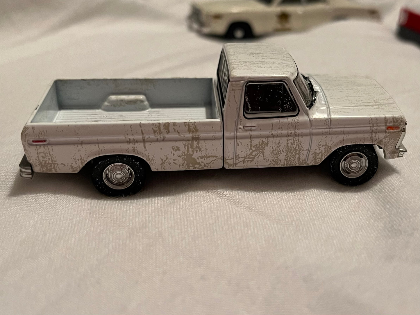 1:64 1973 Ford F-100 White Weathered (Hobby Exclusive) PREORDER Aug