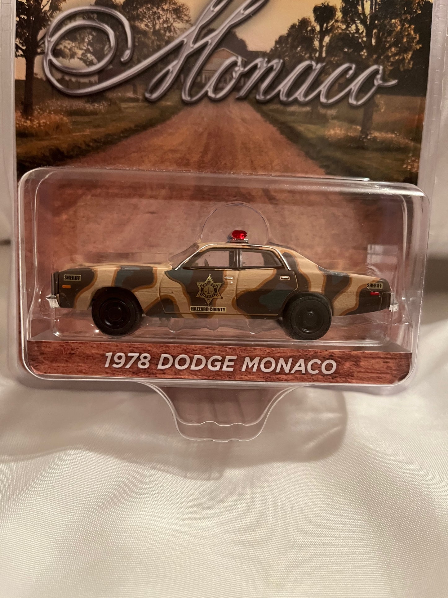 1:64 CAMOUFLAGE 1978 DODGE MONACO HAZZARD COUNTY SHERIFF Discontinued by manufacturer — final inventory!